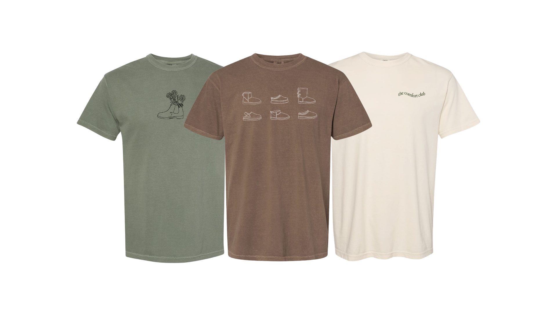 Three short-sleeve crewneck t-shirts displayed side by side on a plain white background: one sage green, one medium brown, and one cream. Each shirt features a minimalist line-art graphic on the chest, including boots and shoes.