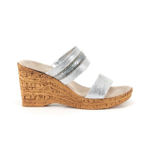 Two strap high heel slide in silver with cork wedge.