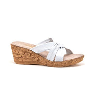 Soft leather slip on wedge in white.