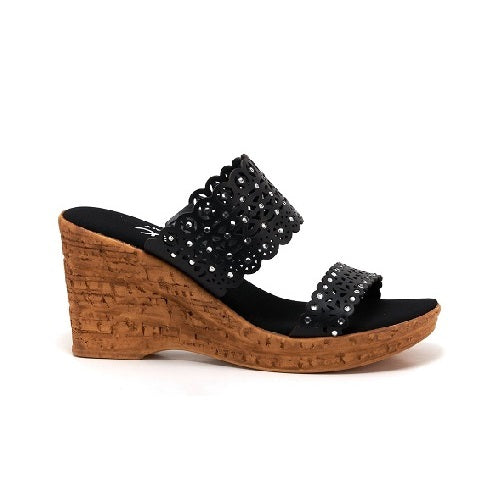 Double strap wedge with jewel and cut out details in black.
