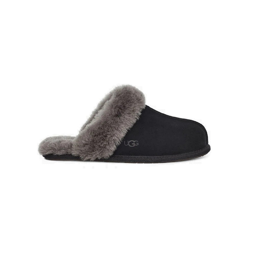 UGG Scuffette closed toe house slipper in black with grey sheepskin lining.