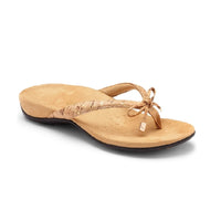 Gold cork flip flop with microfiber lining and bow detail.